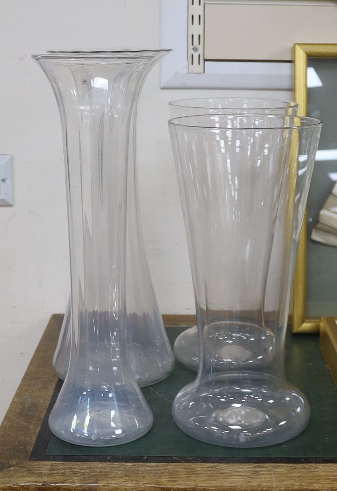 A pair of large glass vases and two similar fluted vases, late 19th century, early 20th 45.5cm